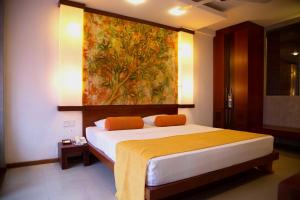 Postel nebo postele na pokoji v ubytování Hotel Topaz