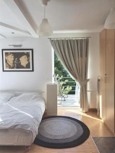 Postel nebo postele na pokoji v ubytování Apartamenty Orłowo
