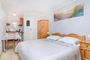 Kuchyňa alebo kuchynka v ubytovaní AMBER DZIWNÓW - Pokoje i Apartamenty & SPA