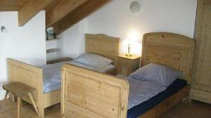Кровать или кровати в номере Jagdschloessl-Tegernsee-Schliersee