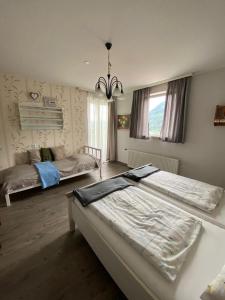 Postel nebo postele na pokoji v ubytování Gasthaus Zum Stadtwald