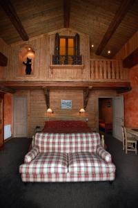 Ein Bett oder Betten in einem Zimmer der Unterkunft Hôtel Christiania