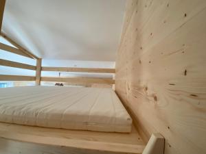 מיטה או מיטות בחדר ב-Appartements Les Homards du Fier #3