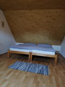 Ein Bett oder Betten in einem Zimmer der Unterkunft Pension Špejchar u Vojty
