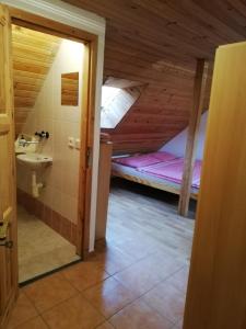 Ein Bett oder Betten in einem Zimmer der Unterkunft Pension Špejchar u Vojty