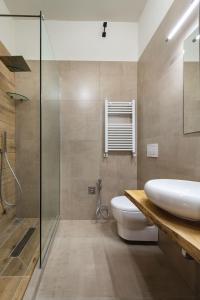 Ένα μπάνιο στο Le Boutique Luxury Rooms