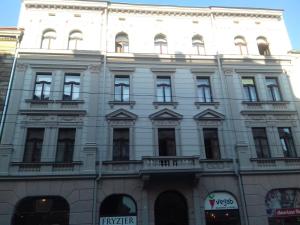 a large white building with a lot of windows at Gorgeous loft in perfect location! in Krakow