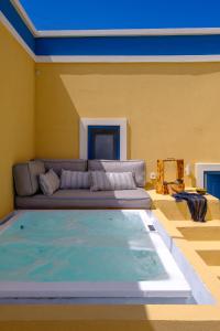 Χώρος καθιστικού στο Pasithea Suites