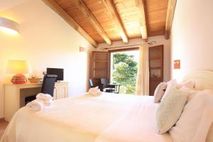 TV o dispositivi per l'intrattenimento presso Alghero Resort Country Hotel & Spa