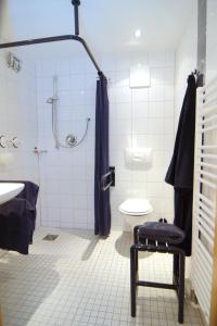 Ein Badezimmer in der Unterkunft Gästehaus Germania