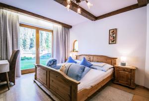 Ένα ή περισσότερα κρεβάτια σε δωμάτιο στο Haus Wulfenia