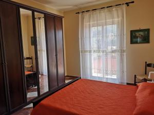 Ένα ή περισσότερα κρεβάτια σε δωμάτιο στο Casa Catena