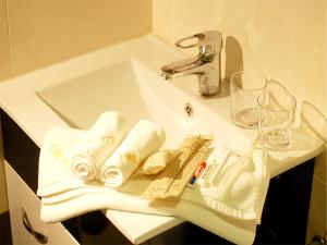 Phòng tắm tại E-Red Hotel Bayu Mutiara