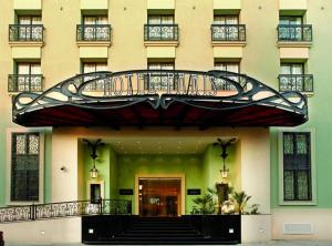 a building with a sign on the front of it at Occidental Lac Tunis in Tunis