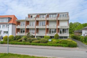 an apartment building on the side of a street at Haus am Deich Wohnung 12 in Dahme