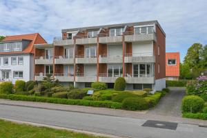 an apartment building on the side of a street at Haus am Deich Wohnung 5 in Dahme
