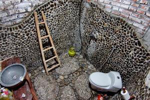 Ванная комната в Santhiku Hotel & SPA