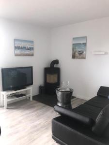 TV a/nebo společenská místnost v ubytování Haus Bachwiesen + 8 fotografií