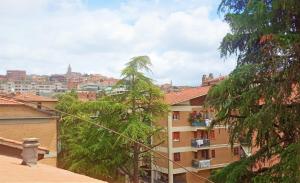 a view of the city from a building at La Mansarda vicino alla stazione in Perugia