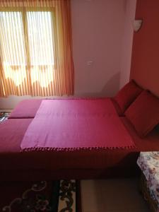 Uma cama ou camas num quarto em Apartman Đorđević