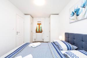 Postel nebo postele na pokoji v ubytování Vacation house Orange