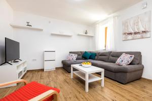 Posezení v ubytování Vacation house Orange