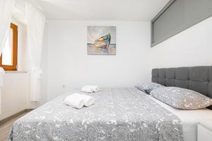 Posteľ alebo postele v izbe v ubytovaní Vacation house Orange