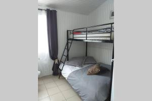 Postel nebo postele na pokoji v ubytování L'appart