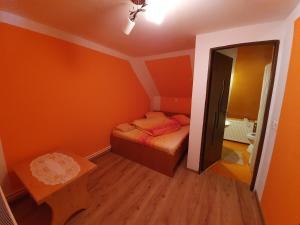 Postel nebo postele na pokoji v ubytování Cabana Popasul Vânătorului