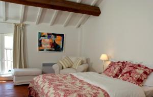 מיטה או מיטות בחדר ב-Château Canet