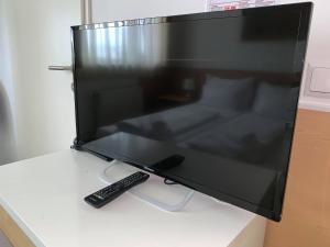 TV a/nebo společenská místnost v ubytování Hotel Donaustadt Kagran - at Metro U1