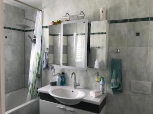 Koupelna v ubytování Chambre d hôtes Le Petit Bonheur