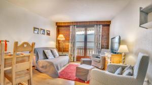 Гостиная зона в Tovassiere - Apt B115 - BO Immobilier- Châtel- Châtel Multipass Été 2025 en option au tarif de 3euros par jour et par personne