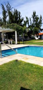 The swimming pool at or close to Pousada e Restaurante Lual do Parajuru