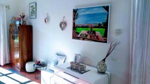 TV a/nebo společenská místnost v ubytování La Chambre de Ker Briac