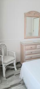 A bed or beds in a room at Apartamento Realengo Sevilla