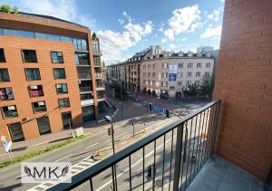 a view of a city street from a balcony at MK Angel Apartment in Krakow