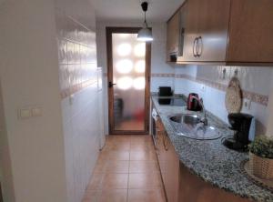 Albir-Beach Apartmentsにあるキッチンまたは簡易キッチン