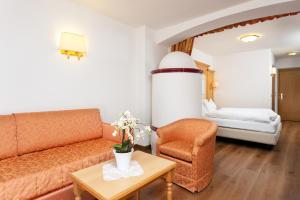 Postel nebo postele na pokoji v ubytování Hotel Gries