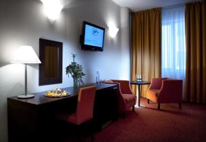 TV a/nebo společenská místnost v ubytování Hotel Tatra