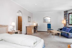 Postel nebo postele na pokoji v ubytování Heart Hotel Sylvia