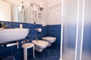 Koupelna v ubytování Hotel Caraibi