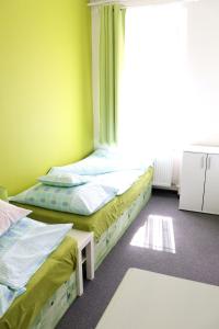 Postel nebo postele na pokoji v ubytování Apartmány Agáta Abertamy