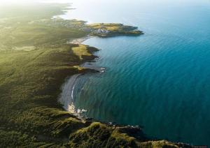 an aerial view of an island in the water at Apart Hotel Apolonia Palace in Sinemorets