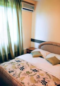 Ένα ή περισσότερα κρεβάτια σε δωμάτιο στο Motel Neno
