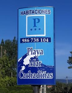 a sign for a margarita mart cafeteria at Pension Playa Mar Cachadiñas in Balea