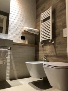 Koupelna v ubytování Hotel Ombra