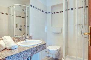 Koupelna v ubytování Komforthotel Kaiserhof