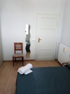 Postel nebo postele na pokoji v ubytování BINARIO 5
