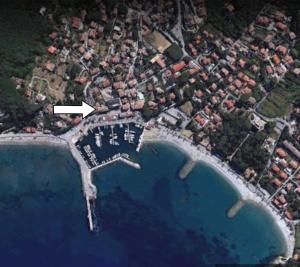 an aerial view of a house next to the water at Cavo Beach 5 in Cavo